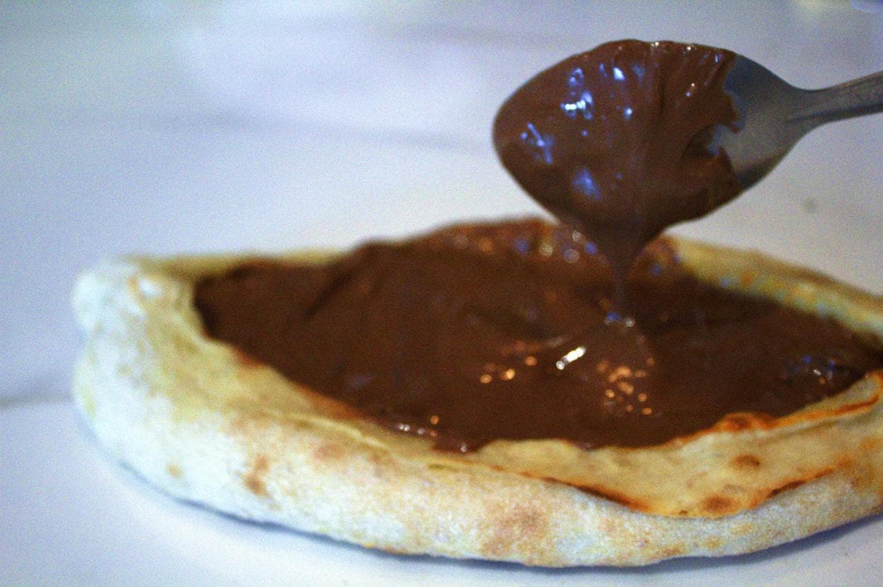 Barca Nutella — Massa doce em formato barca, recheada com Nutella. Porção menor pra fechar a noite.